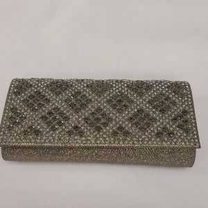 Silver clutch covered in rhinestones